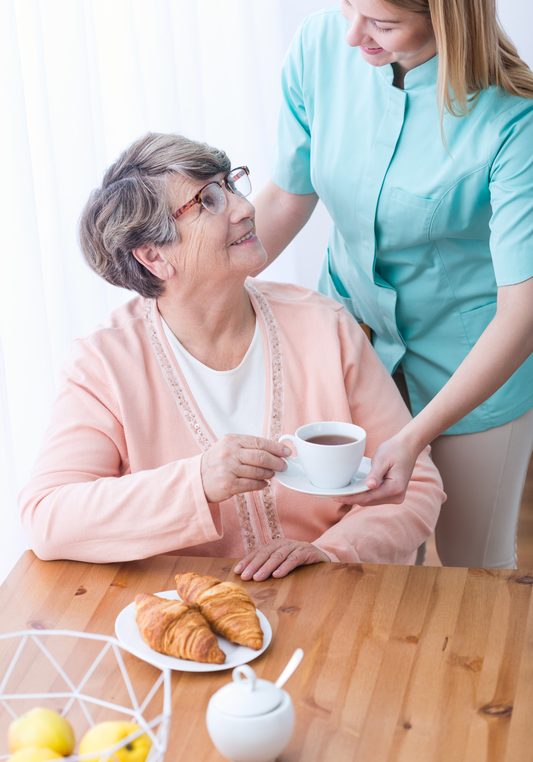 Rich elderly woman having care